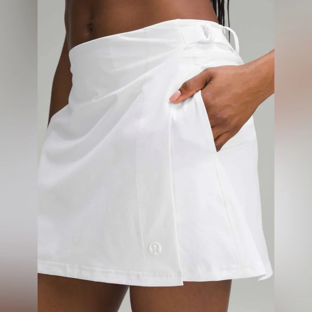 NWT Lululemon Wrap-Front Mid-Rise Golf Skirt
White SIZE 10 $98 sold out - Picture 5 of 11